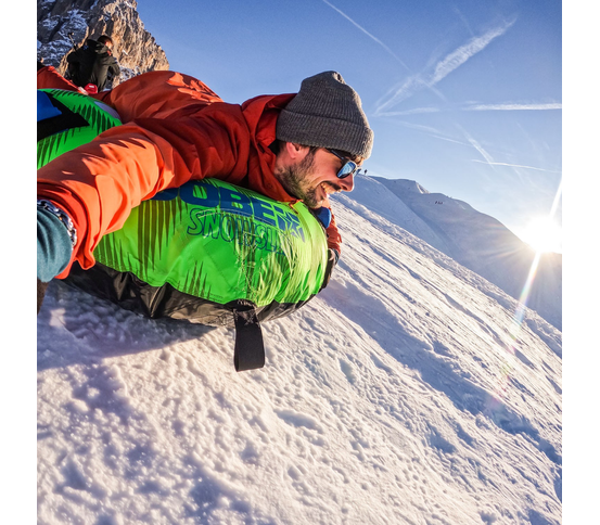 Uppblásanlegur snjótogbelgur